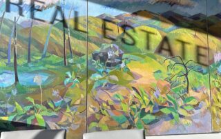 Shadow of the word Real Estate giving the illusion of mindset