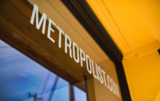 Image of window with Metropolist Real Estate name - showing up