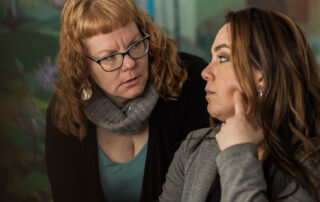 Real estate brokers collaborating during a training session at Metropolist